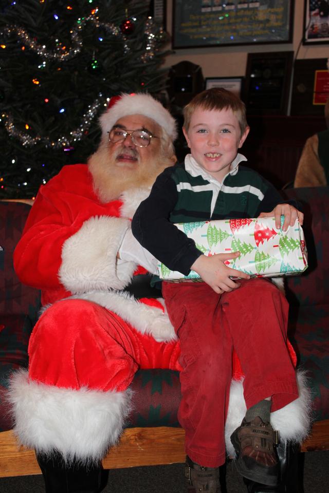 Children's Christmas Party at 8-100. 12-9-2012. Santa pays a visit . Photo by Vincent P. Tuzzolino